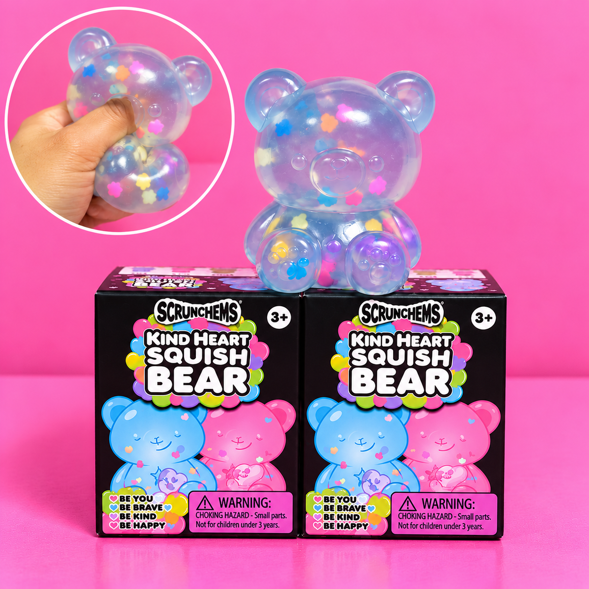Kind Heart Squish Bear with squeeze inset on pink background