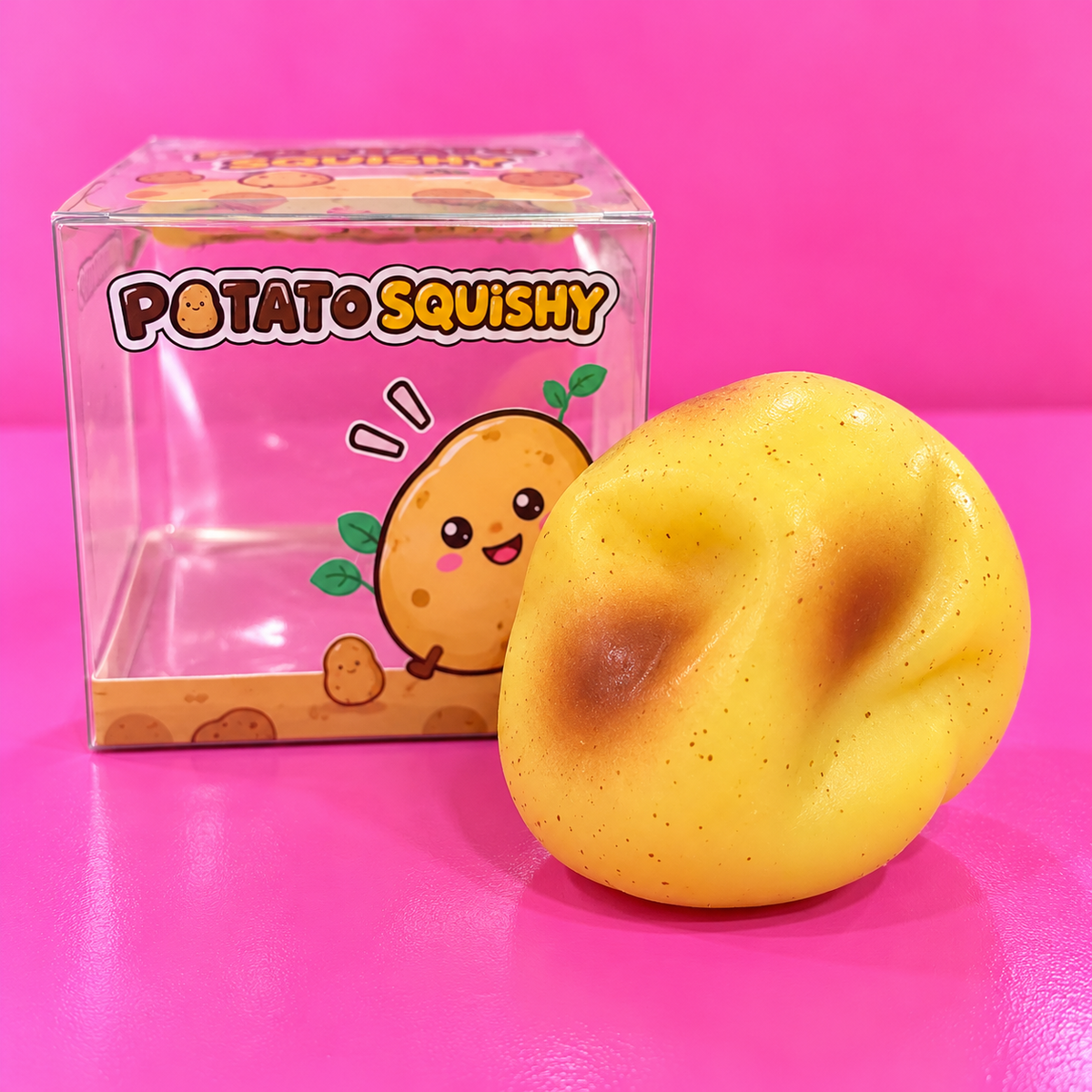 Jelly filled mouldable potato squishy and box on pink background